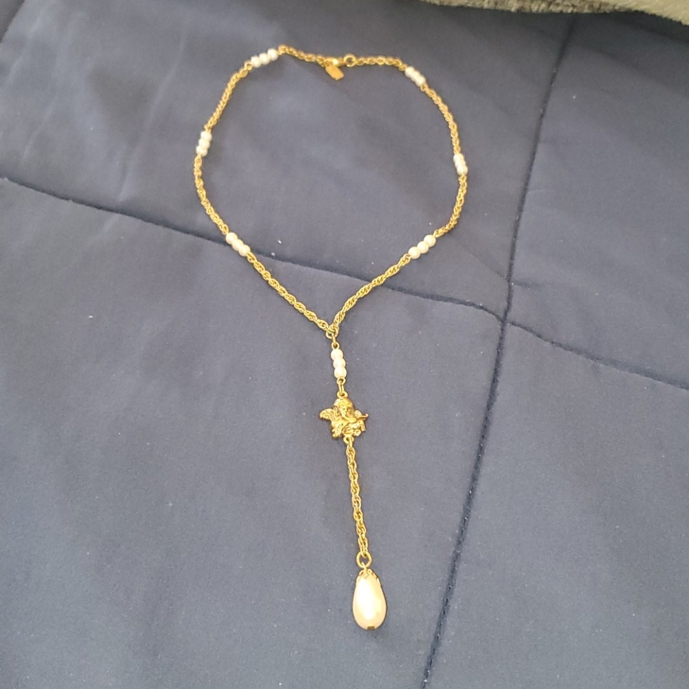 Gold pearl with angel necklace